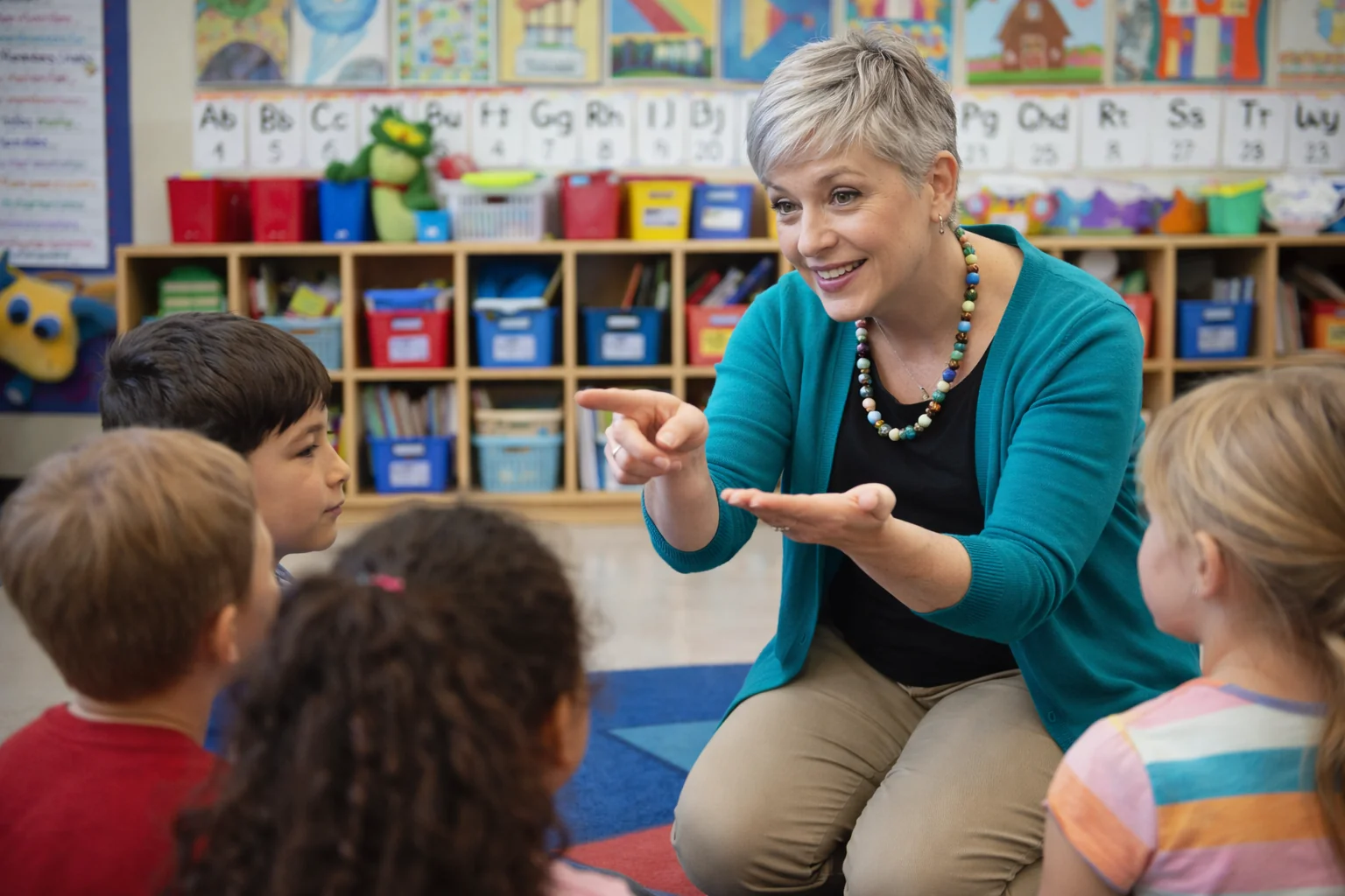 Interpreter engaging with elementary students in a classroom